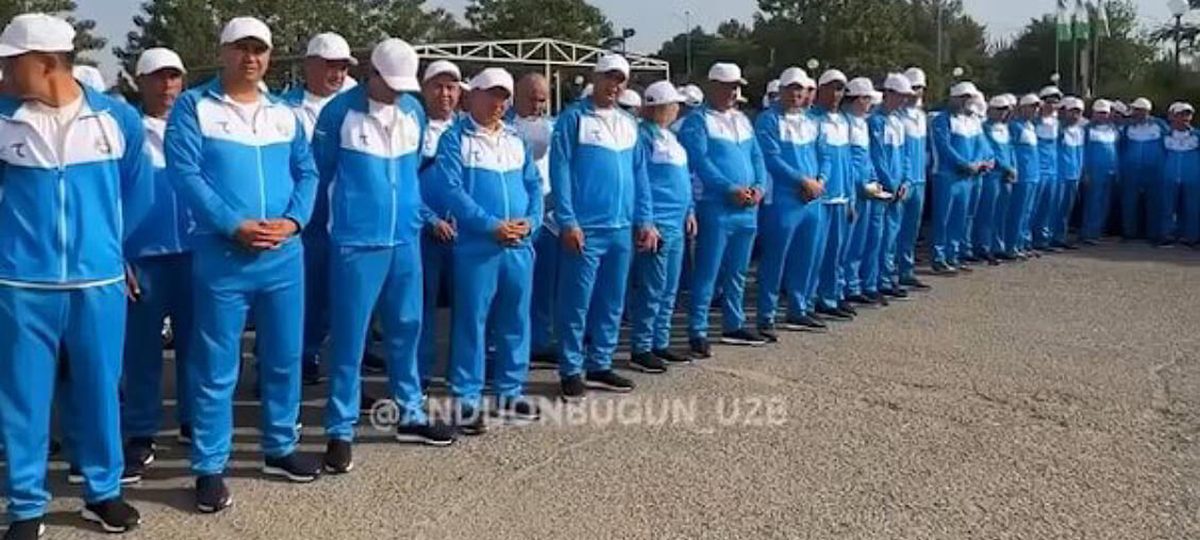 рабочие мигранты в спортивной форме